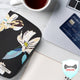 variant:46348414255296travelon RFID Blocking Passport Zip Wallet Midnight Floral