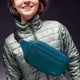 variant:42999678173376 travelon World Travel Essentials Convertible Sling/Waist Pack Peacock Teal